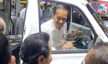 Senyum Jokowi saat Respons Perbedaan Data Rp349 T antara Mahfud MD dan Sri Mulyani