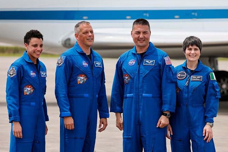 The SpaceX capsule lands, bringing 4 astronauts home from the space station to Earth on Friday