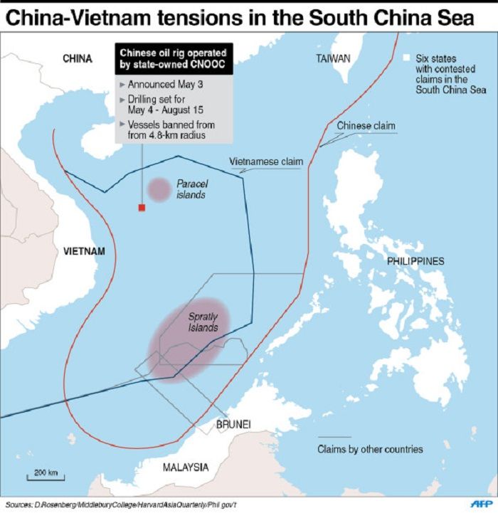 Infografik peta yang menunjukkan  pertikaian antara Vietnam dan Tiongkok di Laut China Selatan.*