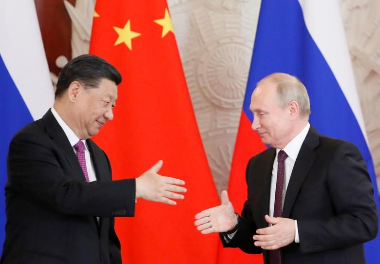 PRESIDEN China Xi Jinping dan Presiden Rusia Vladimir Putin.