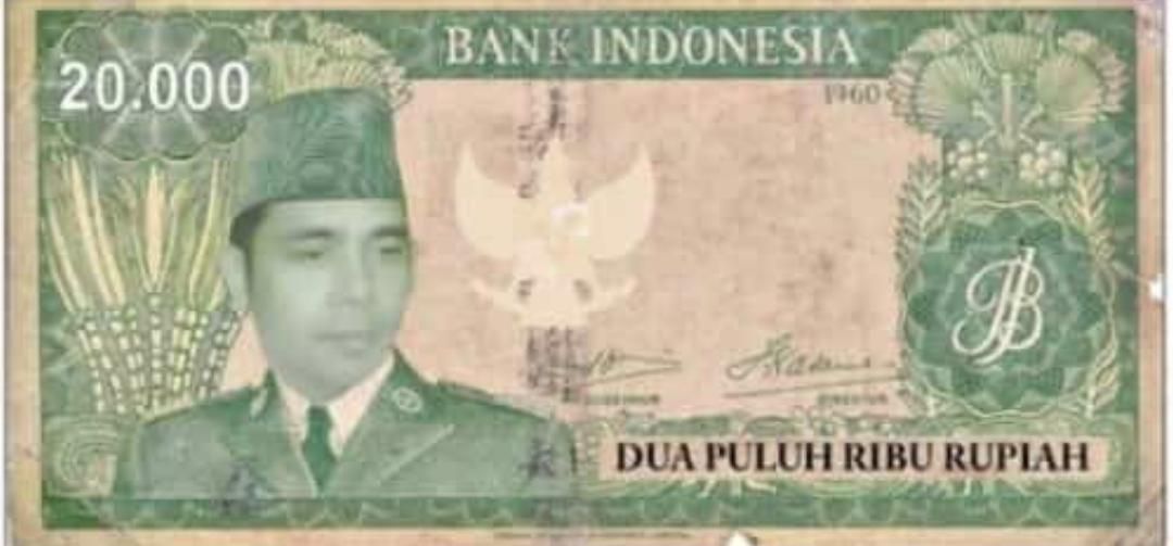Uang pecahan 20.000 bergambar pimpinan Paguyuban Tunggal Rahayu yang dijadikan alat transaksi pengikut organisasi yang berpusat di Garut itu.