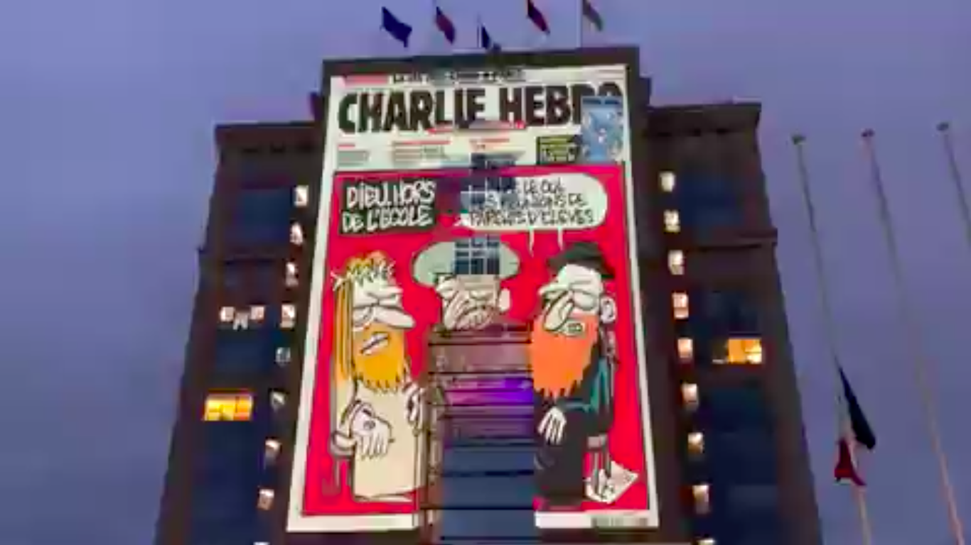 Salah satu gedung pemerintahan di Prancis memasang poster raksasa cover majalan Charlie Hebdo yang bergambar kartun Nabi Muhammad SAW.*