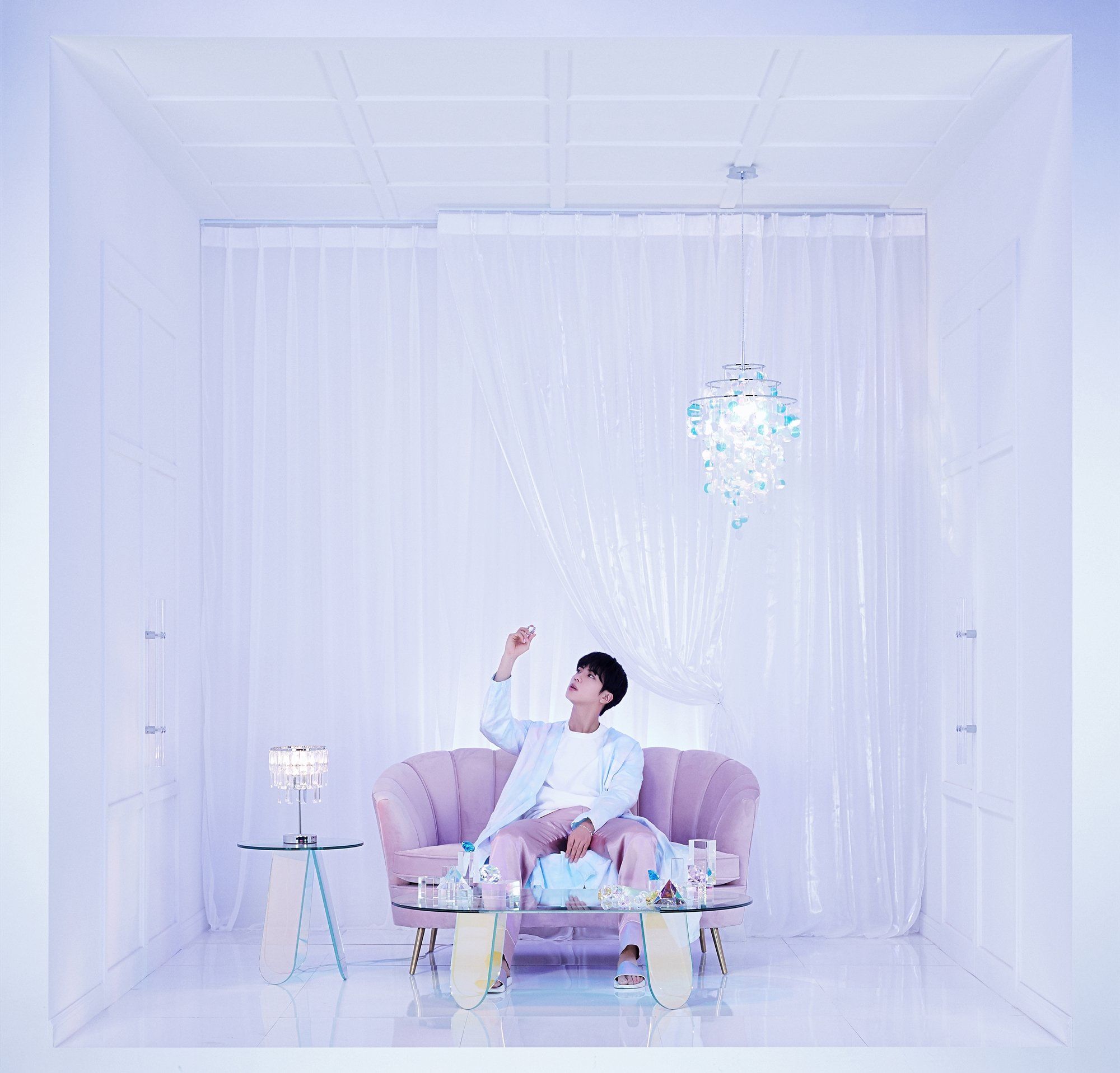 Jin BTS dalam foto konsep album BE Deluxe Edition. 