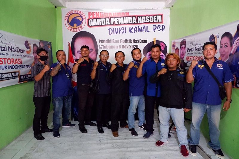 Pengukuhan Garda Pemuda Divisi Kawal PSP Kabupaten Tabanan pada Minggu 8 November 2020 di kantor Ketua BaHu (Bantuan Hukum) DPW Partai NasDem Bali,I Wayan Karta,SH di Kediri,Tabanan