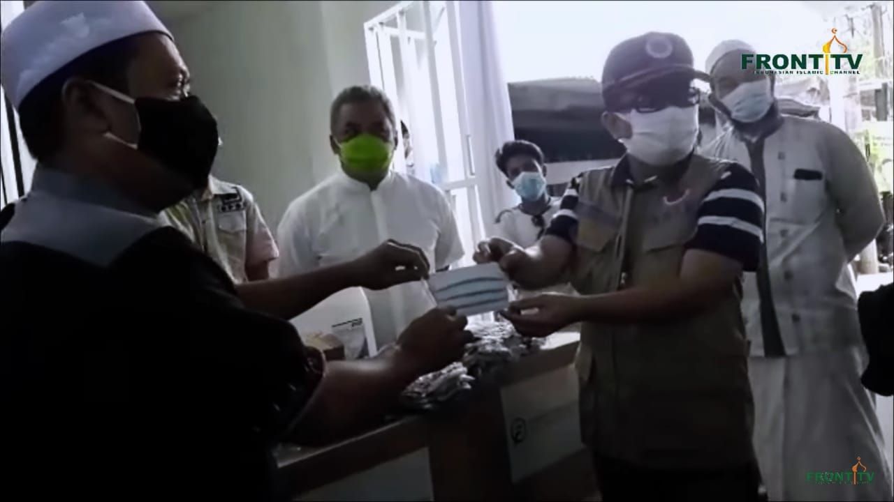 Tangkapan layar prosesi penyerahan bantuan masker dari BNPB kepada