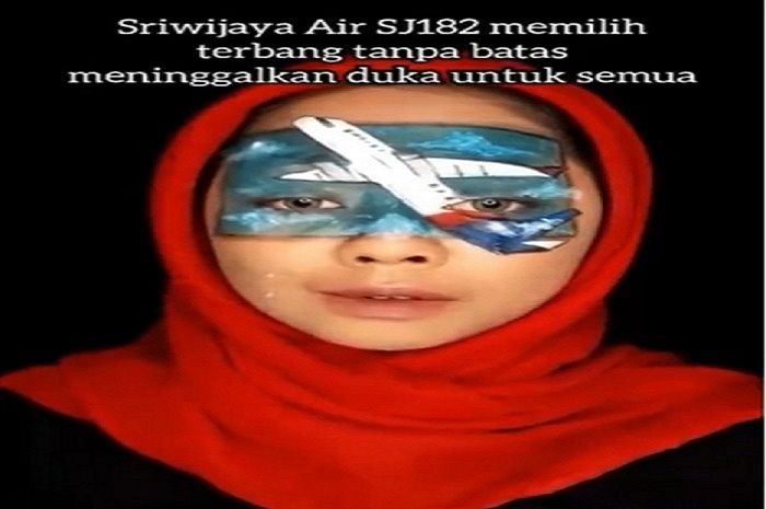 Lukisan pesawat Sriwijaya Air SJ 182.
