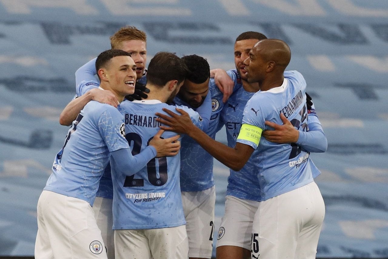Pemain Man City merayakan kemenangan atas PSG di Liga Champions.