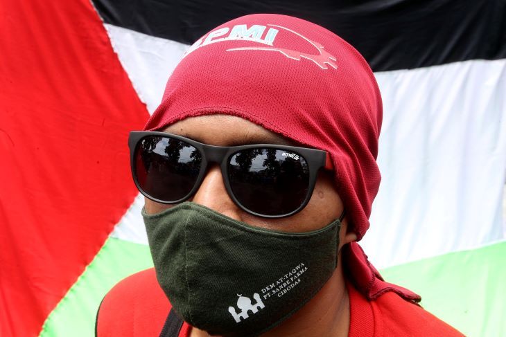 Aksi  Aliansi Muslim Bela Palestina (Almubina)  tuntut aksi militer Israel terhadap rakyat Palestina dihentikan.