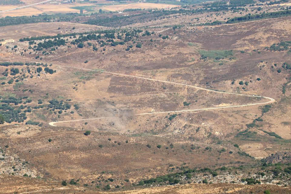 Pemandangan menunjukkan kerusakan akibat serangan udara Israel seperti yang terlihat dari Marjayoun, dekat perbatasan dengan Israel, Lebanon 5 Agustus 2021. 