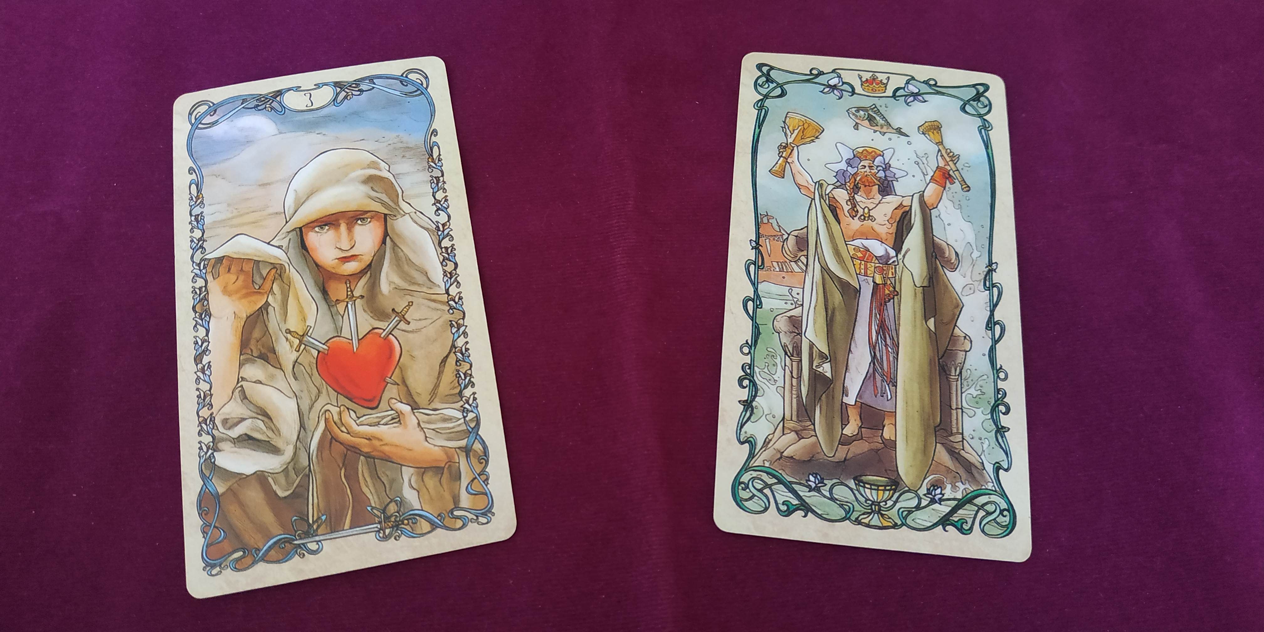 3 of Swords and King of Cups