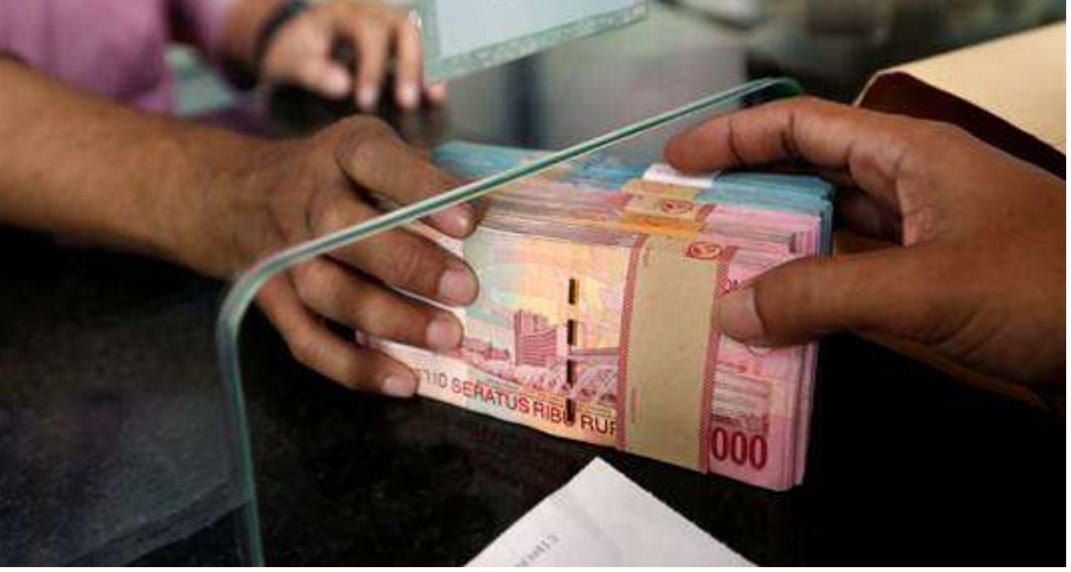 Ilustrasi transaksi perbankan di KUR BSI