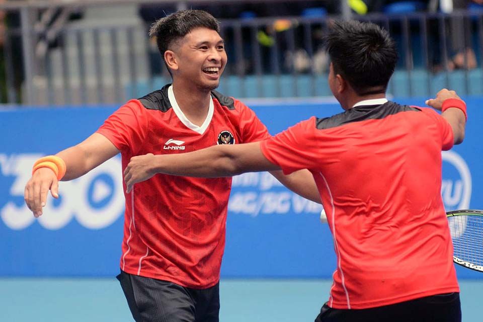 Tim tenis Indonesia membuat kejutan dengan menyingkirkan tuan rumah di babak pertama tenis beregu putra SEA Games 2021 Vietnam di Stadion Tenis Hanaka Bac Ninh, Vietnam, pada Jumat, 13 Mei 2022 hari ini.