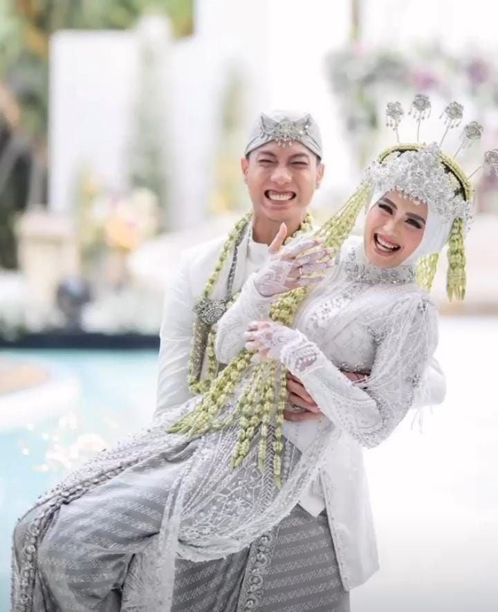 Pasangan Suami Istri Atlet Voli Indonesia Yuda Mardiansyah dan Legisya Nur Aisyah