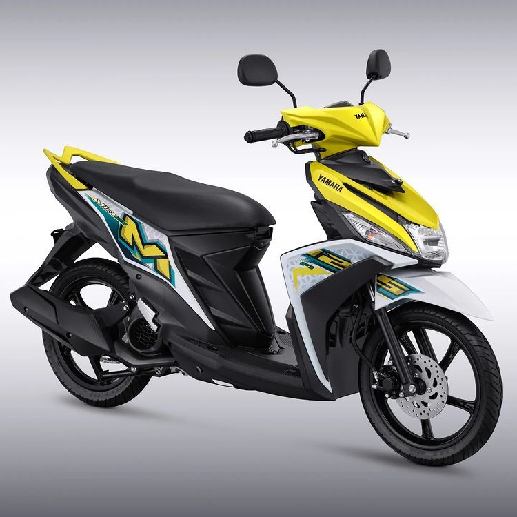 Sepeda motor matic Yamaha Mio M3 125,  irit bahan bakar, desain sporty dan modern, fitur canggih seperti Y-Connect, bagasi luas, ground clearance tinggi.