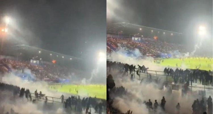 Asap gas air mata memenuhi tribun penonton di Stadion Kanjuruhan, hingga kepanikan terjadi.
