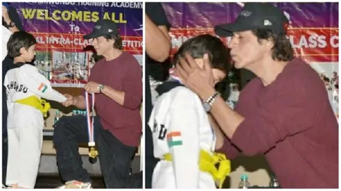 Shah Rukh Khan memberikan medali emas kepada Taimur Ali Khan di pertandingan taekwondo Mumbai.*  