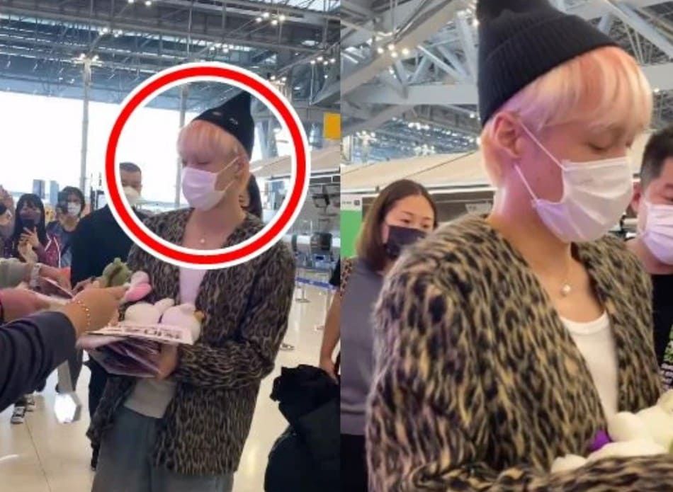 Lay EXO tiba di bandara Thailand sebelum terbang ke Korea Selatan.
