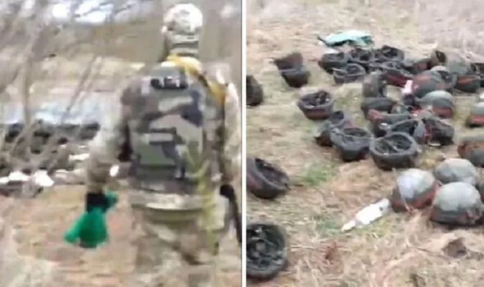 Tentara Ukraina menertawakan peralatan tentara Rusia yang dibuang di tepi Sungai Dnipro, Kherson.*  