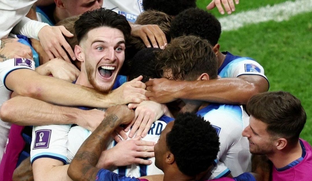 Pemain timnas Inggris, Marcus Rashford merayakan gol pertama bersama skuadnya. 