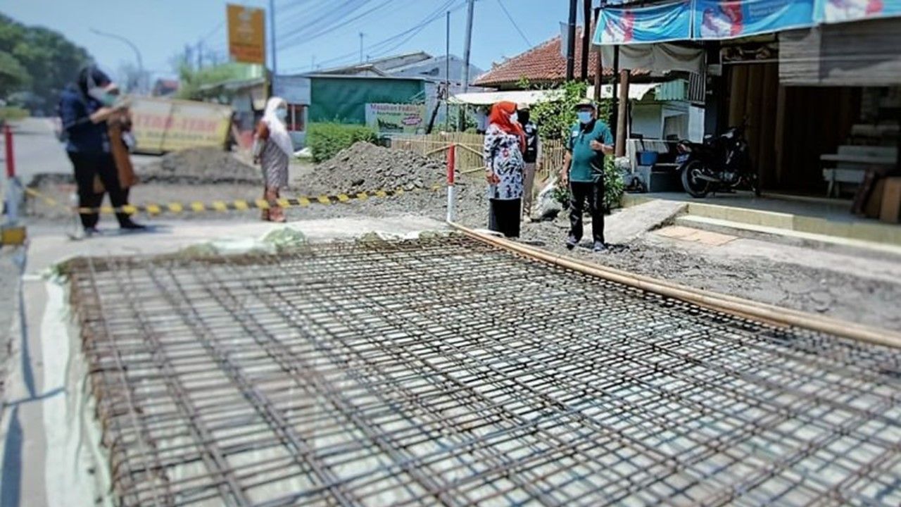 ilustrasi perbaikan jalan di Kabupaten Tegal