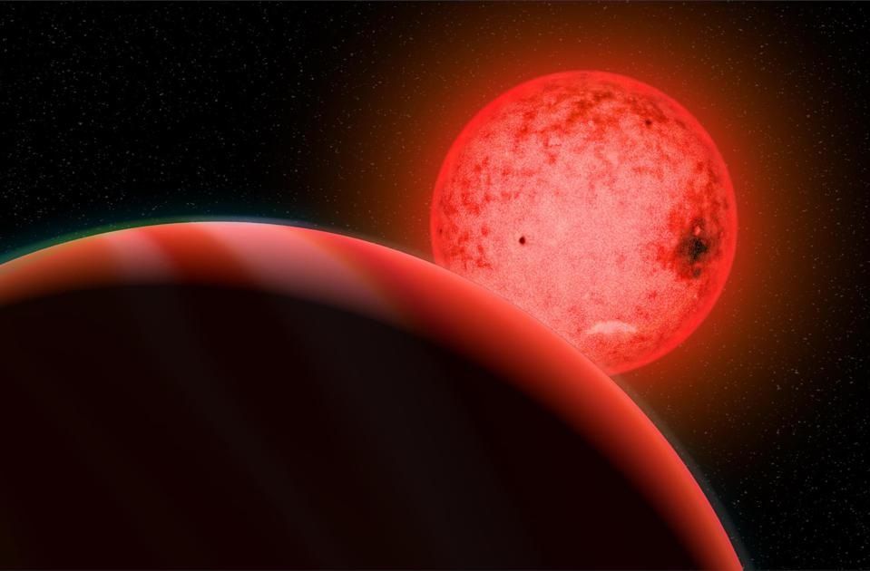 Konsep artis tentang planet raksasa gas besar yang mengorbit bintang katai merah kecil bernama TOI-5205. ... /plus/GAMBAR OLEH KATHERINE CAIN, COURTESY OF THE CARNEGIE INSTITUTION FOR SCIENCE/forbes.com/
