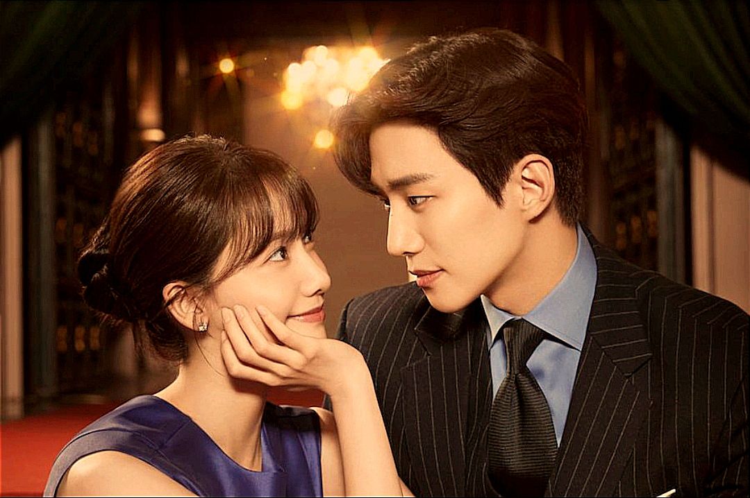 Bikin Meleleh! Tatapan Mesra YonaA dan Lee Junho dalam Poster Drama Romantis JTBC: King The Land 