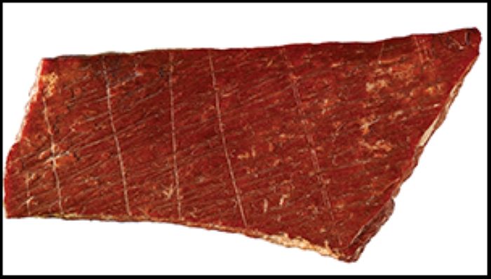 Fragmen tulang itu kemungkinan terukir secara simbolis oleh Denisovans.