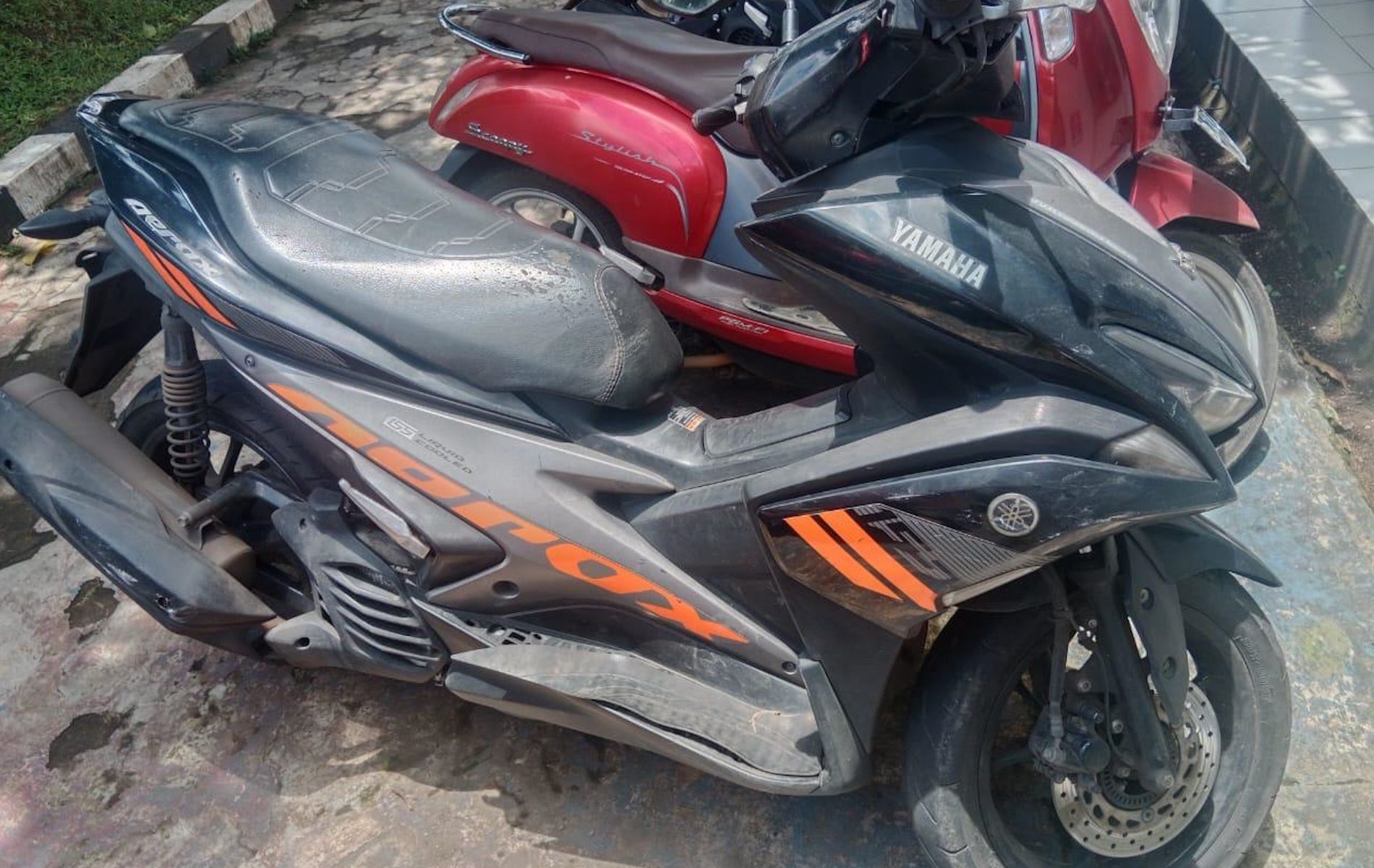 Barang bukti berupa motor Yamaha Aerox yang sempat dirampas para matel di Parung, Bogor, Jawa Barat.