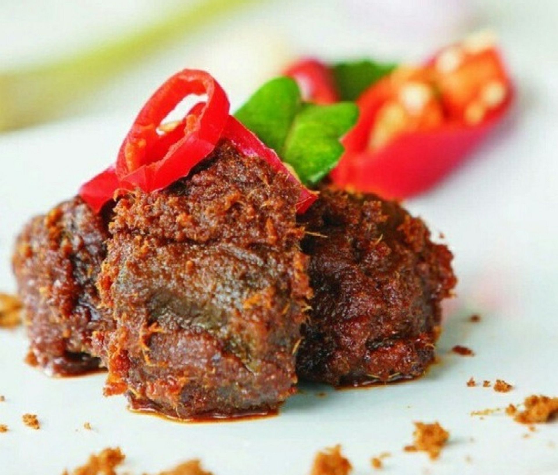 Ilustrasi rendang. Resep rendang daging sapi khas Padang empuk dan berempah ala Chef Devina Hermawan, menu spesial Idul Adha