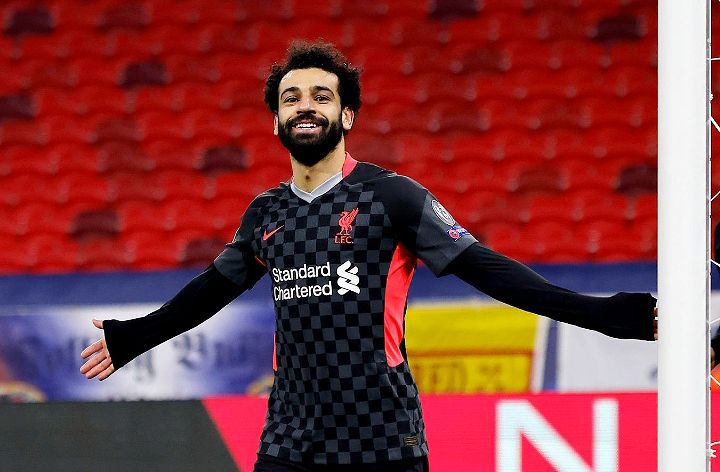 Striker Liverpool, Mohamed Salah saat merayakan gol kemenangan ke gawang Leipzig pada Liga Champions.