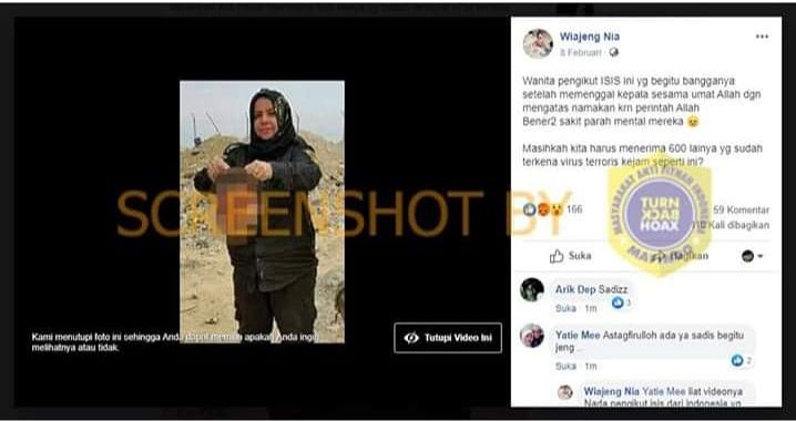HOAX Viral Wanita Pengikut ISIS dengan Bangga Tunjukkan Kepala Hasil Penggalannya.*