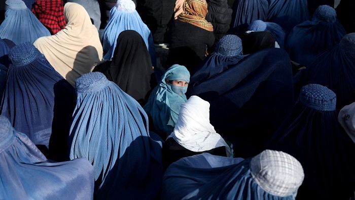 Ilustrasi kaum perempuan Afghanistan yang dibatasi pergerakannya oleh Taliban.