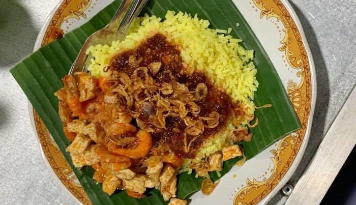 Resep nasi kuning rumahan yang kaya akan rempah.