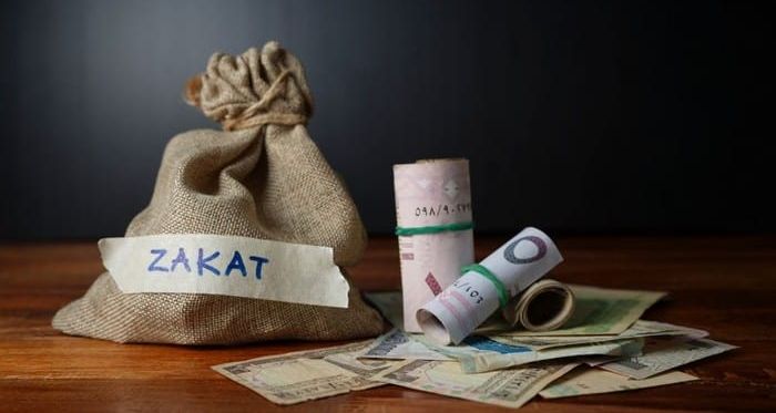 Ilustrasi zakat. Kunci jawaban PAI kelas 9 halaman 79 80 bagian C tentang zakat