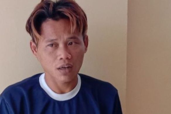 Tersangka ER (33) pelaku pembunuhan dan rudapaksa terhadap korban K (29) warga di  Perumahan Kota Baru Arjasari Blok B2, Desa Arjasari, Kecamatan Arjasari, Kabupaten Bandung .