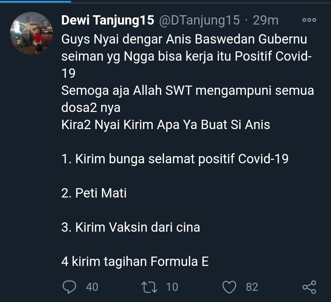 Postingan cuitan Dewi Tanjung