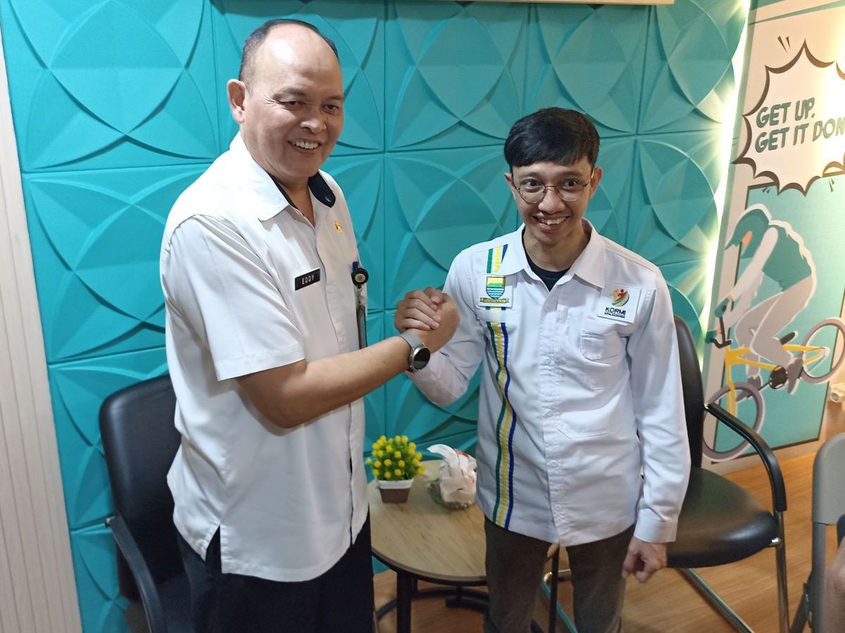 Kepala Dispora Kota Bandung Eddy Marwoto bersama Ketua KORMI Kota Bandung Erick M. Zaki