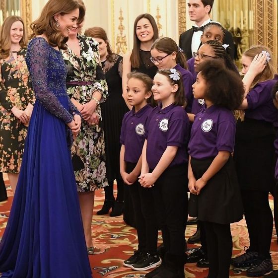 THE Duchess mengenakan gaun manik-manik Jenny Packham berwarna biru royal.*