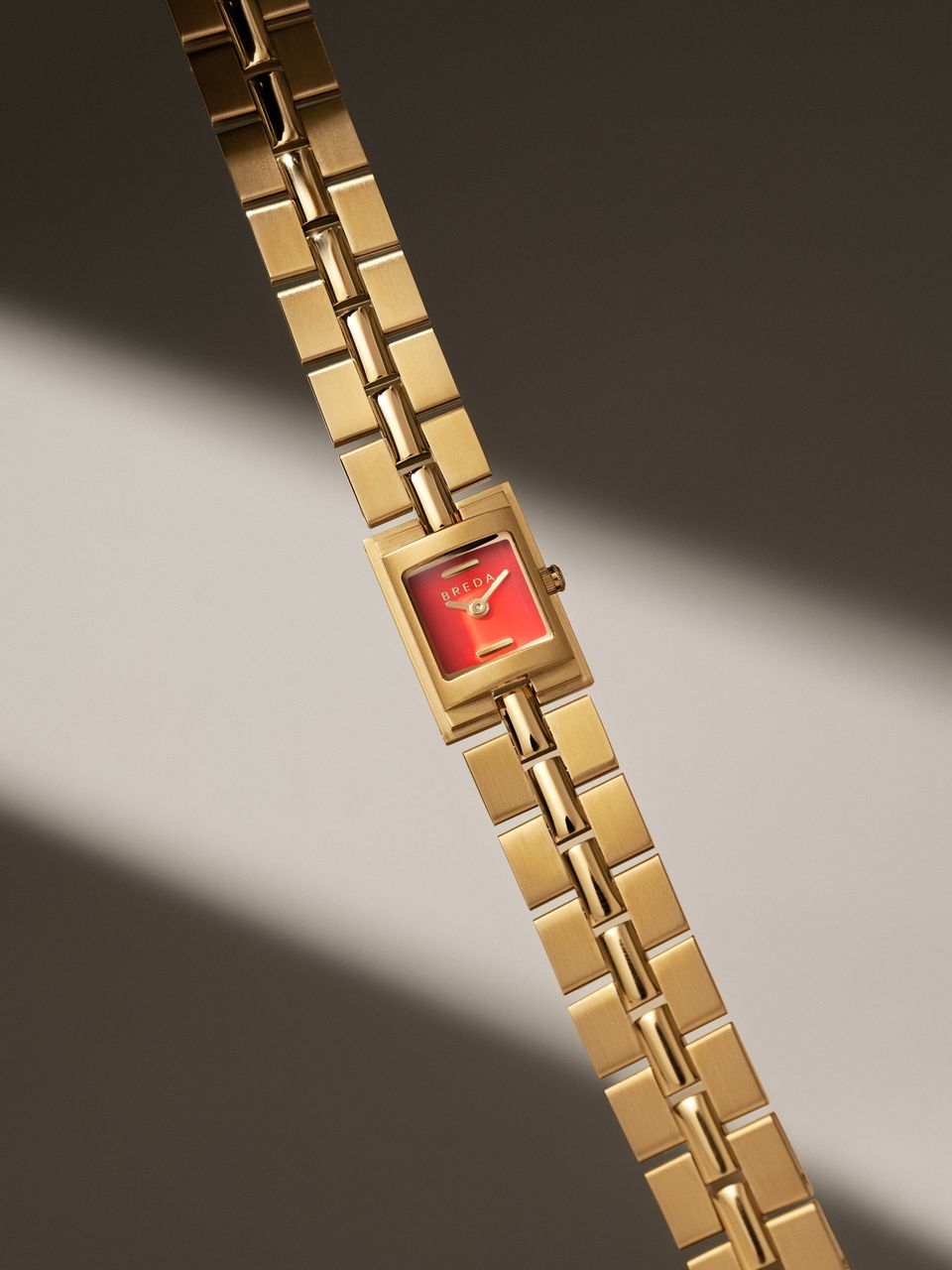 BREDA Relic Scarlet Dial Gold Metal Bracelet