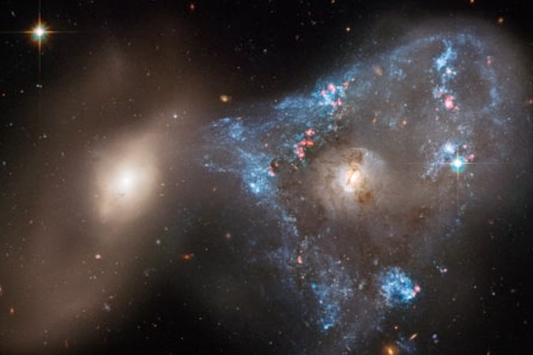 Collision of Two Galaxies in Space Creates a Star Tsunami, a Rare Phenomenon after 100 Million Years