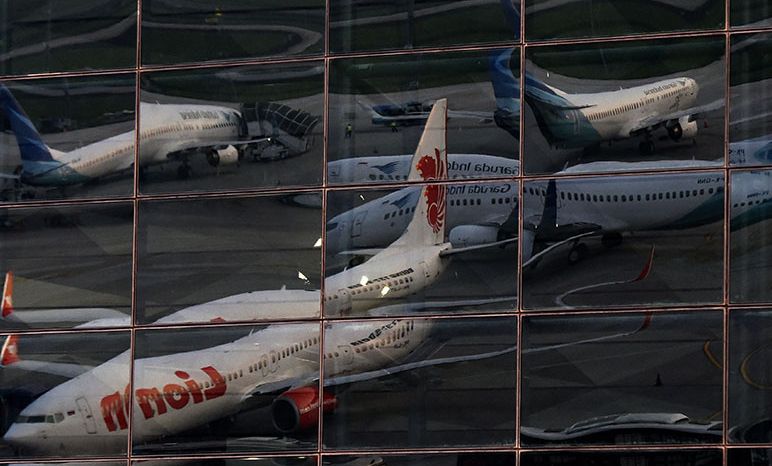 Ilustrasi - Sejumlah pesawat terparkir di apron (lahan parkir pesawat) di Bandara Internasional Soekarno Hatta, Tangerang, Banten